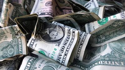 DOLLARSEDLAR. Foto: AP Photo/Mark Lennihan, File