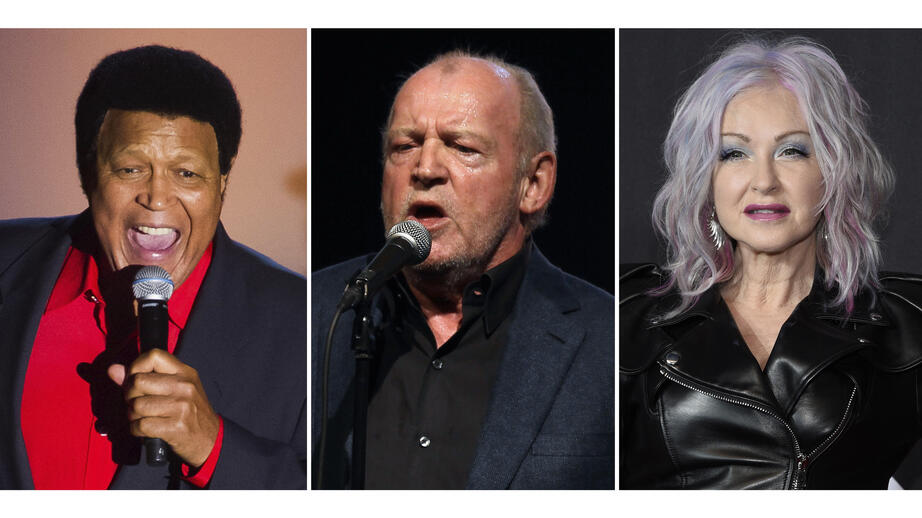 Chubby Checker, vänster, Joe Cocker, mitten och Cindy Lauper, höger är alla invalda i årets Rock and Roll Hall of Fame.