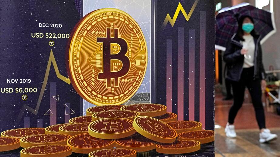 Britain Crypto Regulation. Foto: AP Photo/Kin Cheung
